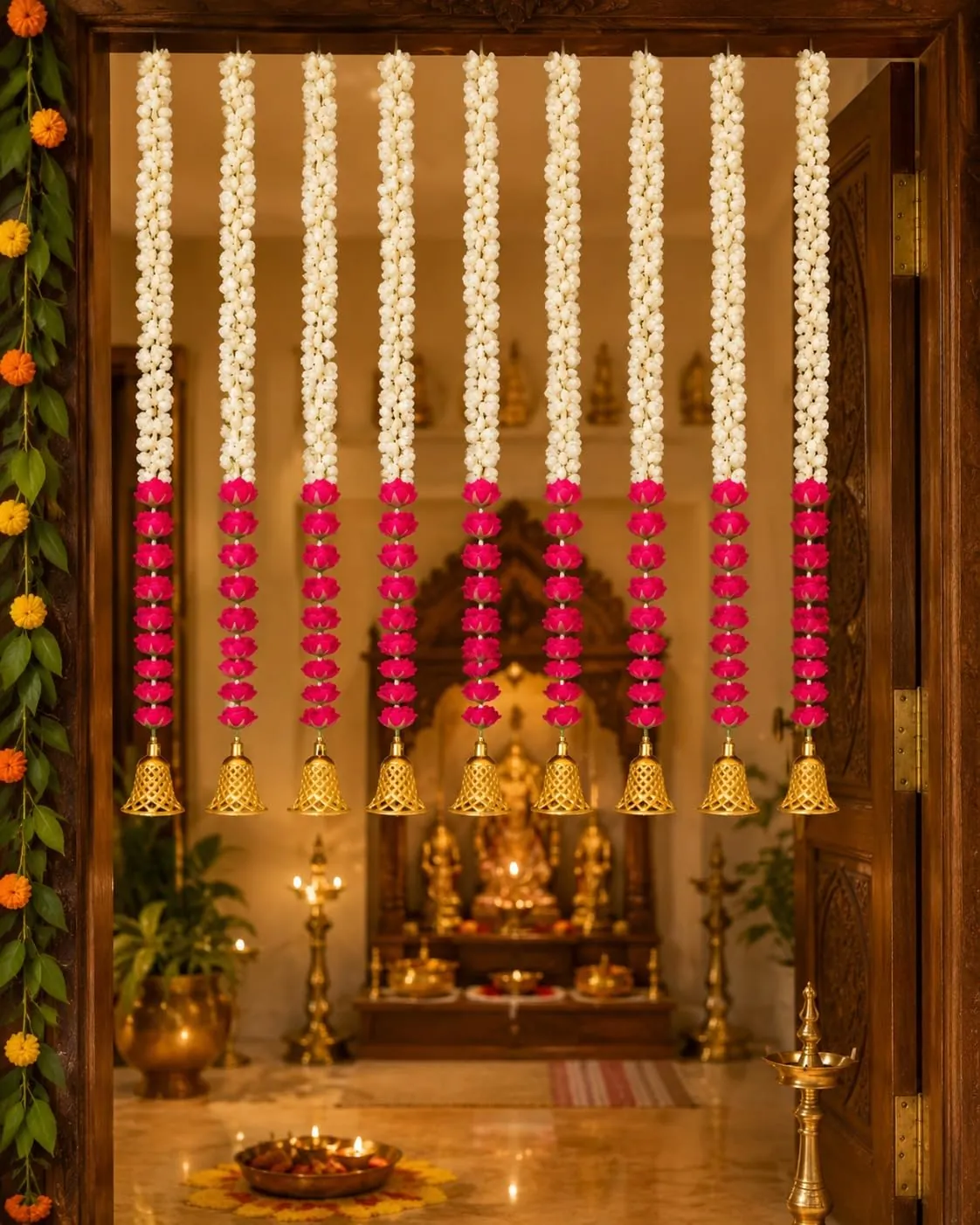 Red and white mogra garlands with bells hung in rows across a room